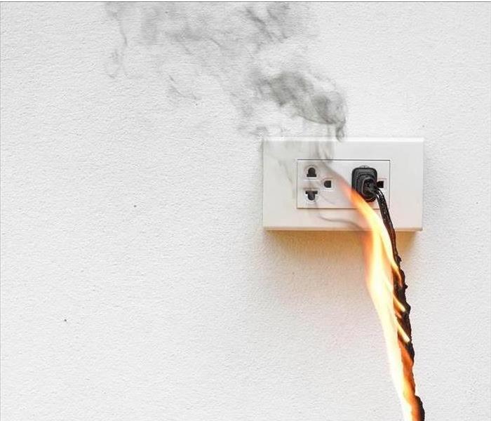 Image of a plug with fire